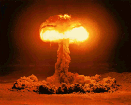 Color image of a ground-based atomic explosion and mushroom cloud