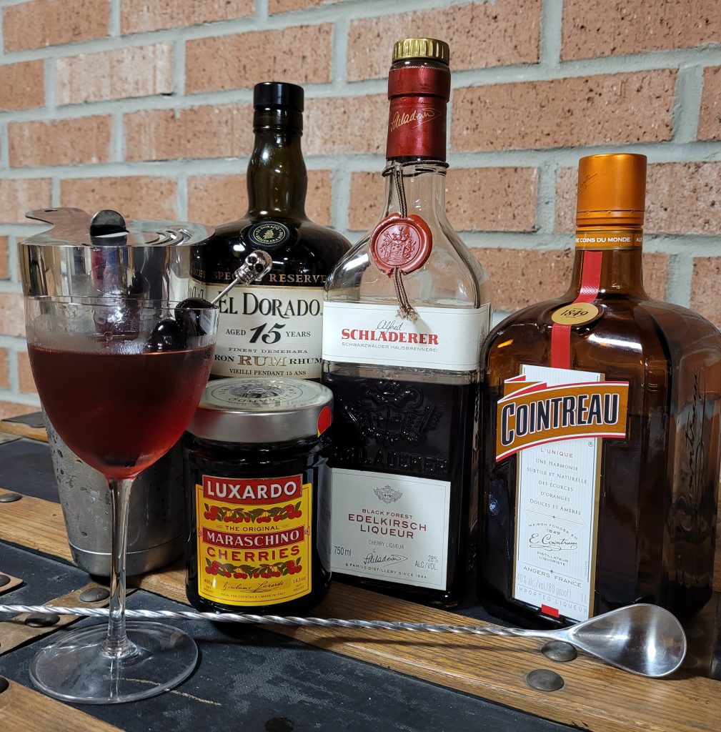 Mystery Drink ingredients: El Dorado 15 year special reserve, Schladerer Edel-Kirsch, Cointreau, Luxardo Maraschino Cherries